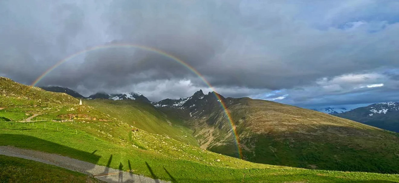 ch-graubuenden - Muottas Muragl Abendstimmung mit Regenbogen