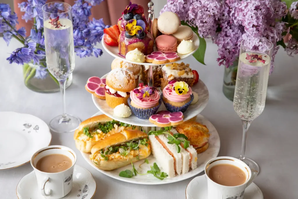 en_cotswolds - Traditional english afternoon tea with selection of cakes and sandwiches resize